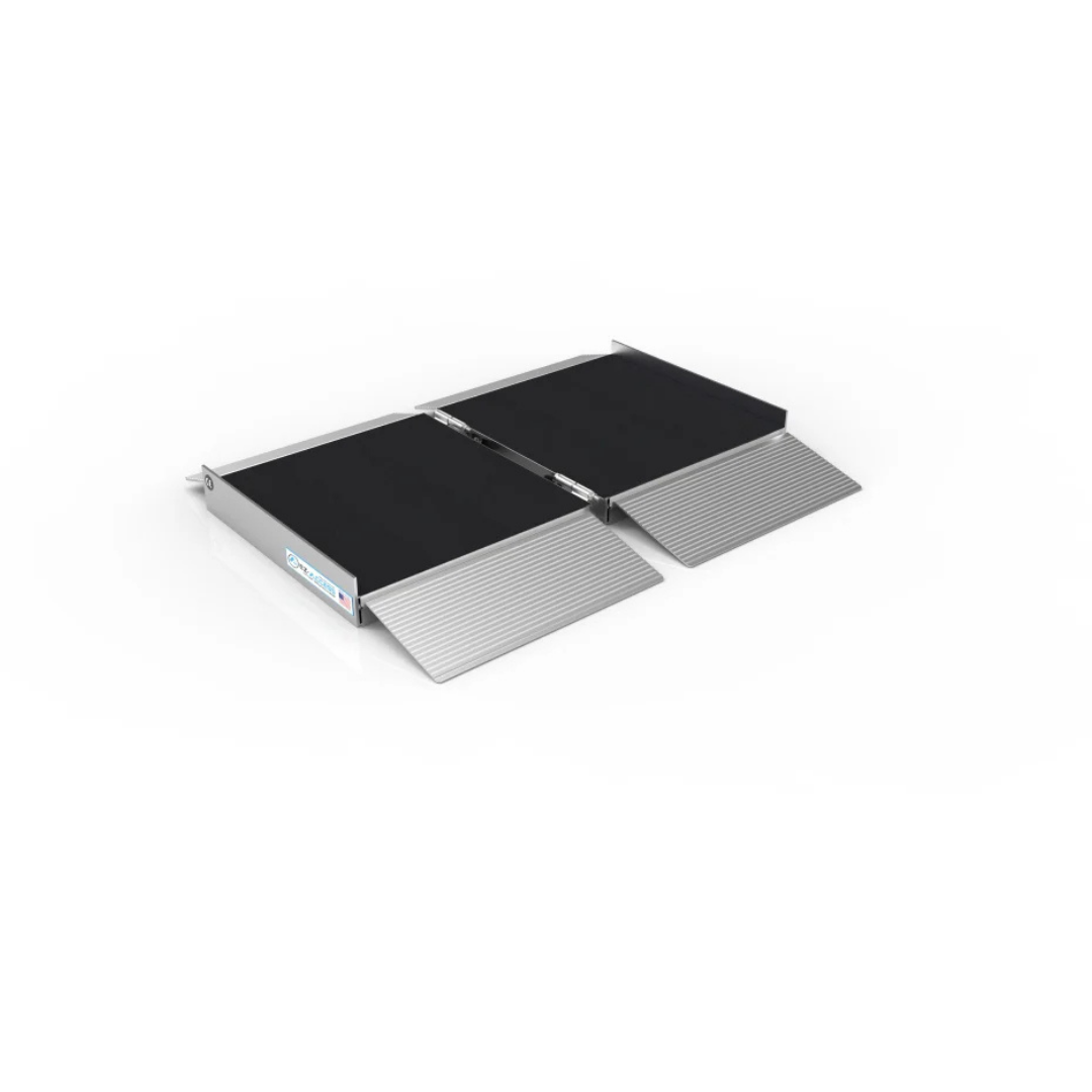 The EZ-Access SUITCASE® Singlefold AS Portable Ramp features a silver metallic frame and black slip-resistant panels, offering a portable solution for safe accessibility over steps or curbs.